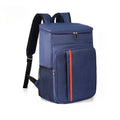 TrailPack cooler backpack in navy blue, angled view showing straps and side pocket