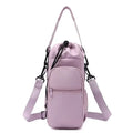 Light purple CarrySling bottle carrier bag with adjustable strap, front zipper pocket, and drawstring top