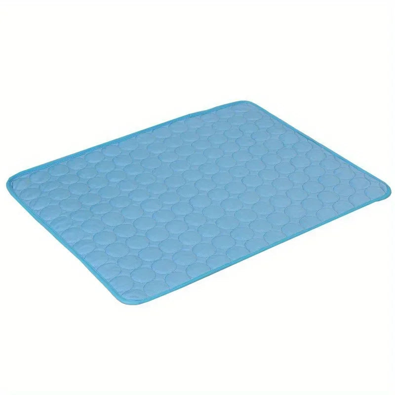 CoolMat pet cooling mat in blue, quilted circle pattern, laid flat
